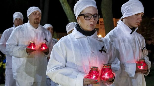 Candles were lit at a ceremony in Slavutych, a town built to re-house workers who lived near the nuclear plant.